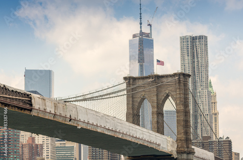 Brooklyn Bridge surrounded by Manhattan skyscrapers © jovannig