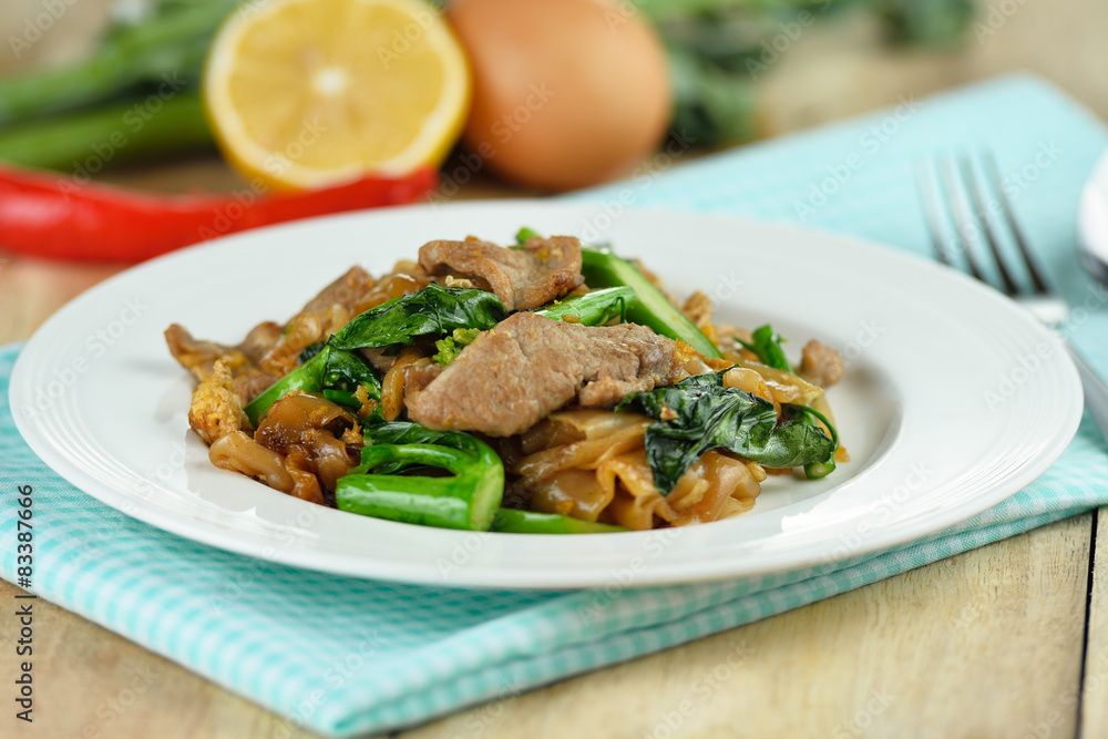 Stir-fried Noodles with pork and chinese broccoli in Sweet Soy Stir-fried Noodles with pork and chinese broccoli in Sweet Soy