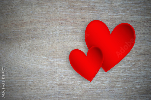 red hearts on grunge wood background