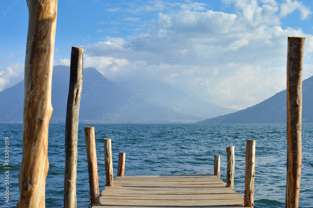 Boat dock on the Lake Atitlan with volcanoes on the background. Landscapes of Central America