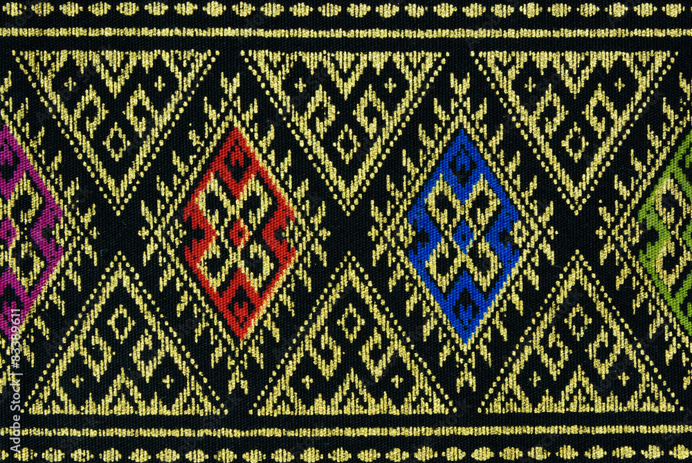 Texture of Thai style golden braid fabric pattern