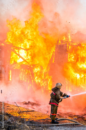 Fireman extinguishes a fire