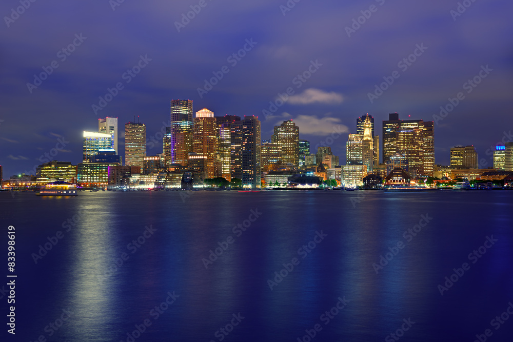 Boston skyline at sunset and river in Massachusetts