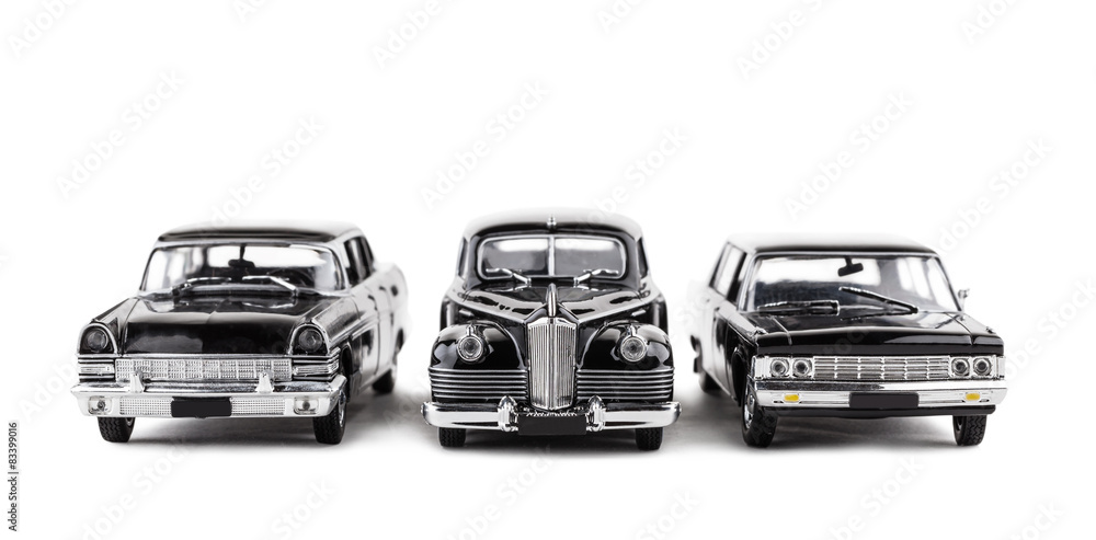 three vintage toy cars