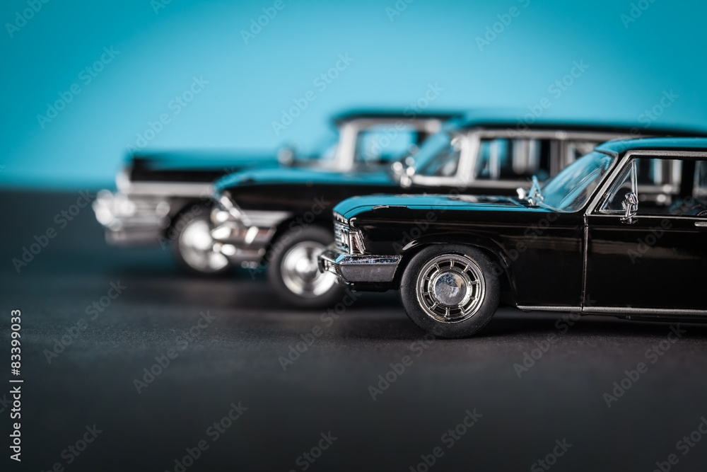 vintage toy cars standing sideways