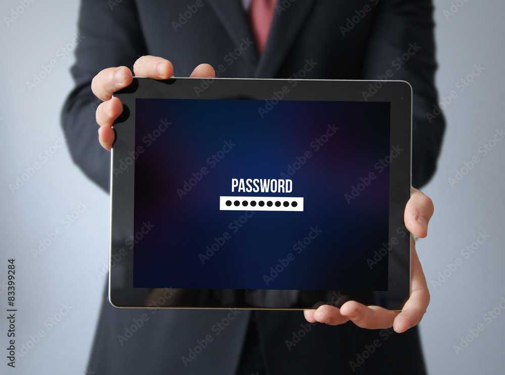 businessman with password  on a tablet