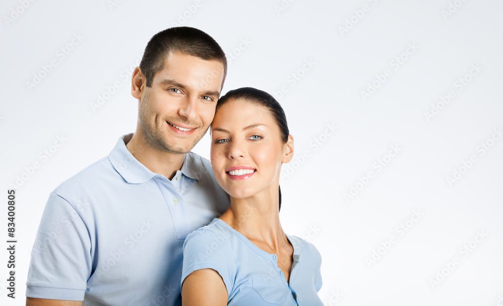 Portrait of cheerful young couple, with copyspace Portrait of cheerful young couple, with copyspace