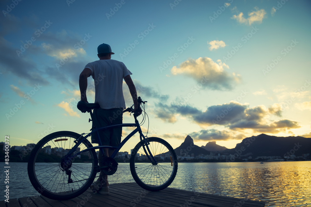Sunset Silhouette Man with Bicycle Lagoa Rio de Janeiro Brazil Sunset Silhouette Man with Bicycle Lagoa Rio de Janeiro Brazil