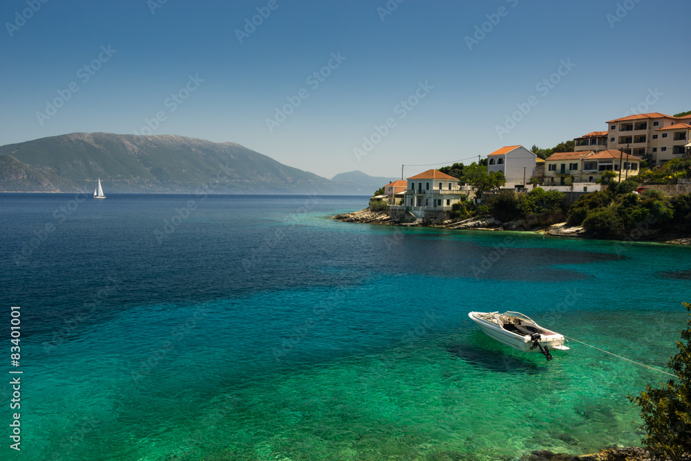 Speedboat moored in a turquoise bay in Kefalonia