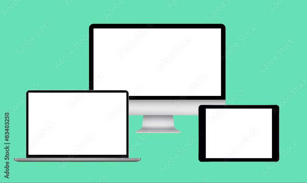 Blank computers on green background Blank computers on green background