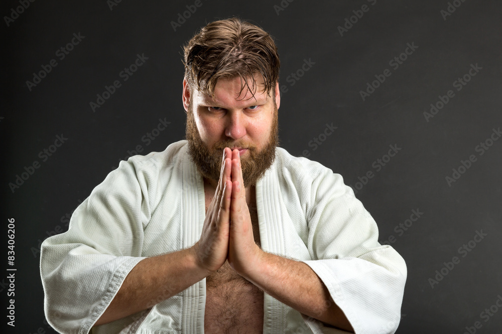 Karate fighter meditating Karate fighter meditating