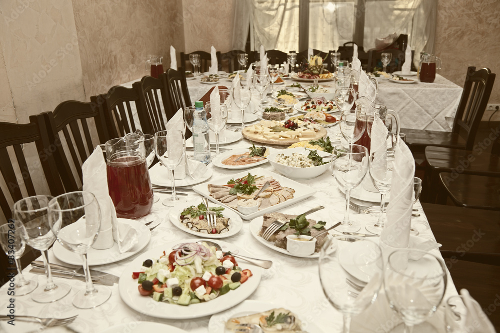 Banquet table in a restaurant Banquet table in a restaurant
