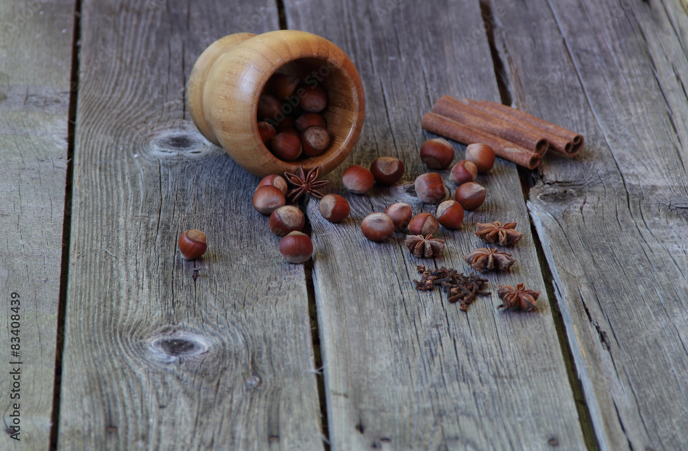 Wood nut, asterisks of an anise, a stick of cinnamon and a carna Wood nut, asterisks of an anise, a stick of cinnamon and a carna