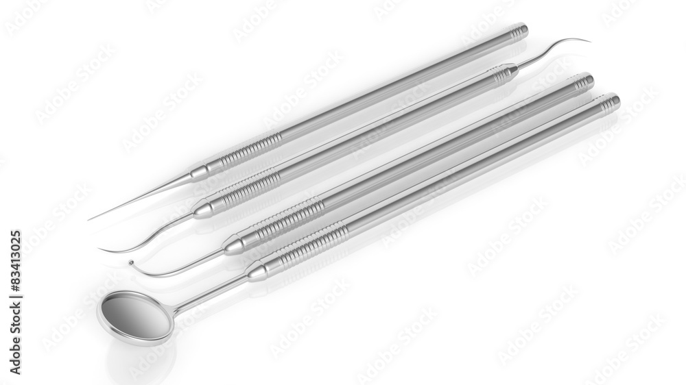 Set of stainless dental instruments isolated on white background Set of stainless dental instruments isolated on white background