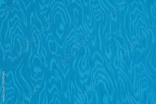 Blue cyan silk damask fabric with moire pattern photo