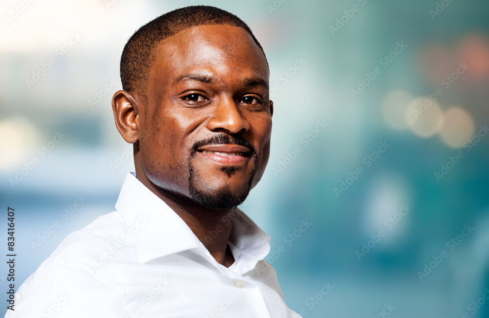 Confident african businessman in his office Confident african businessman in his office