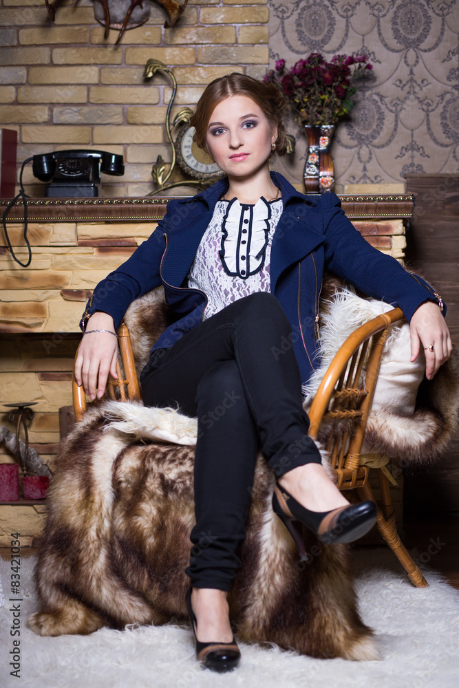 Obraz premium Young woman in blue jacket