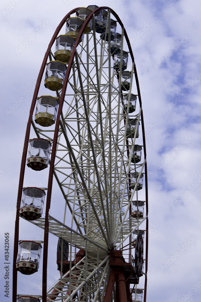 Ferris wheel on the sky with clouds background. Ukraine. Kharki Ferris wheel on the sky with clouds background. Ukraine. Kharki