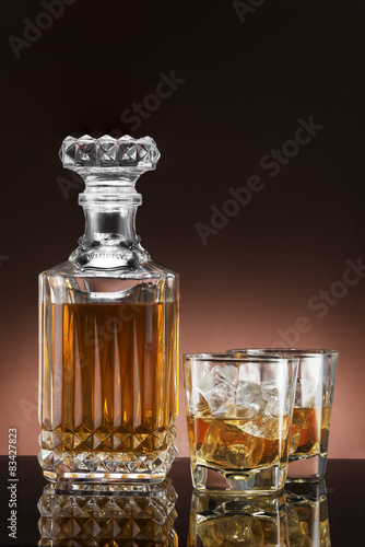 Glass and luxury bottle of liquor