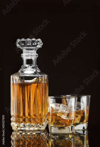 Glass and luxury bottle of liquor