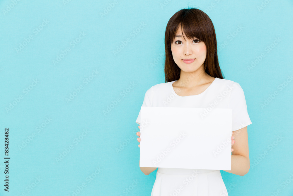 attractive asian nurse on blue background attractive asian nurse on blue background
