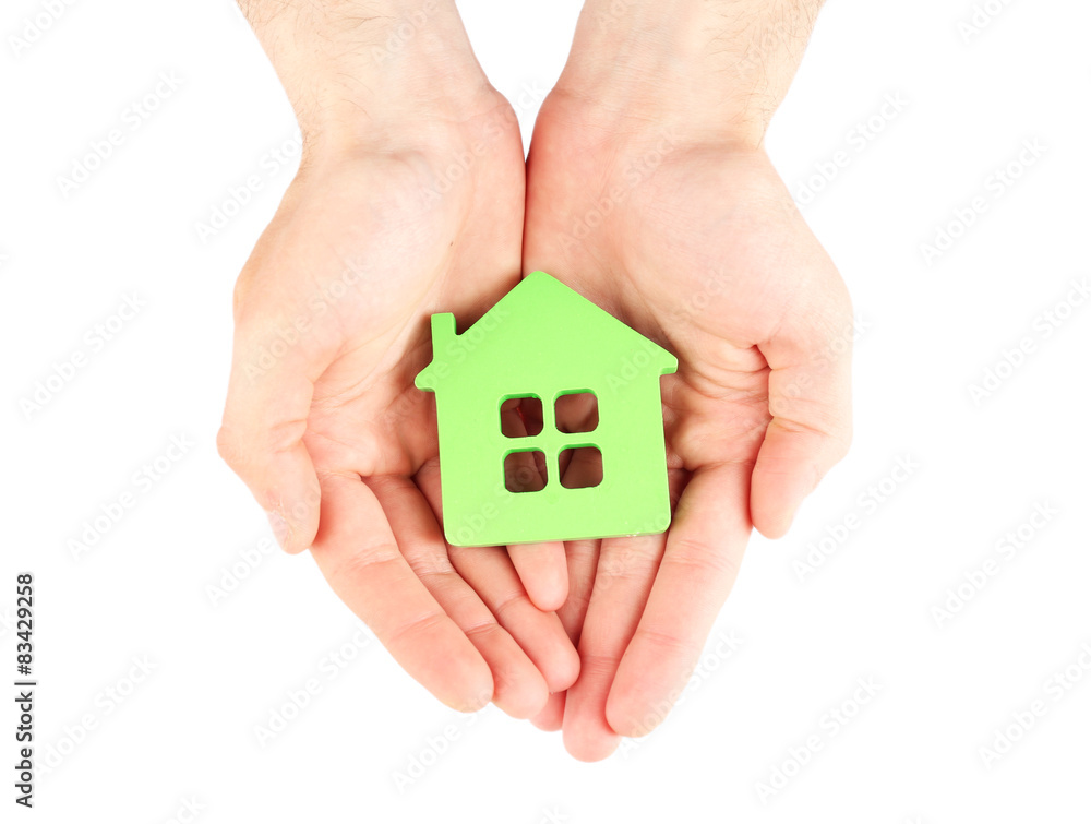 Female hands holding house isolated on white Female hands holding house isolated on white