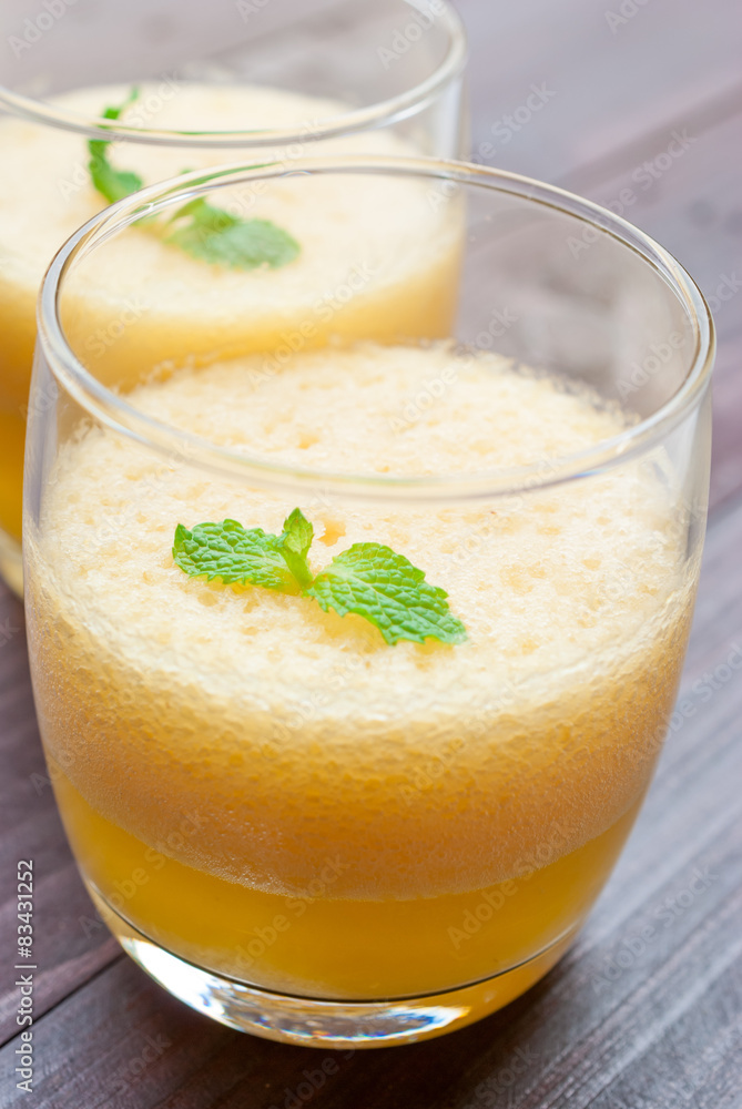 pineapple juice and pineapple on wood table. for health pineapple juice and pineapple on wood table. for health