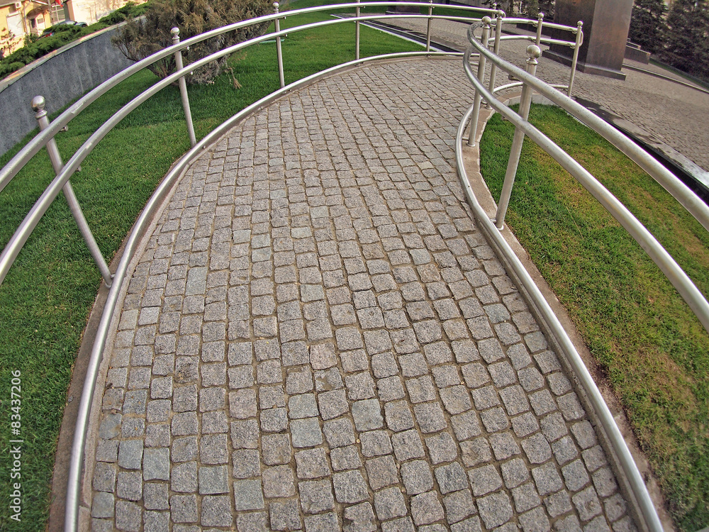 Ramp for physically challenged from the granite pavement Ramp for physically challenged from the granite pavement