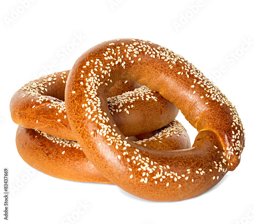 Bagels with sesame seeds isolated on white background