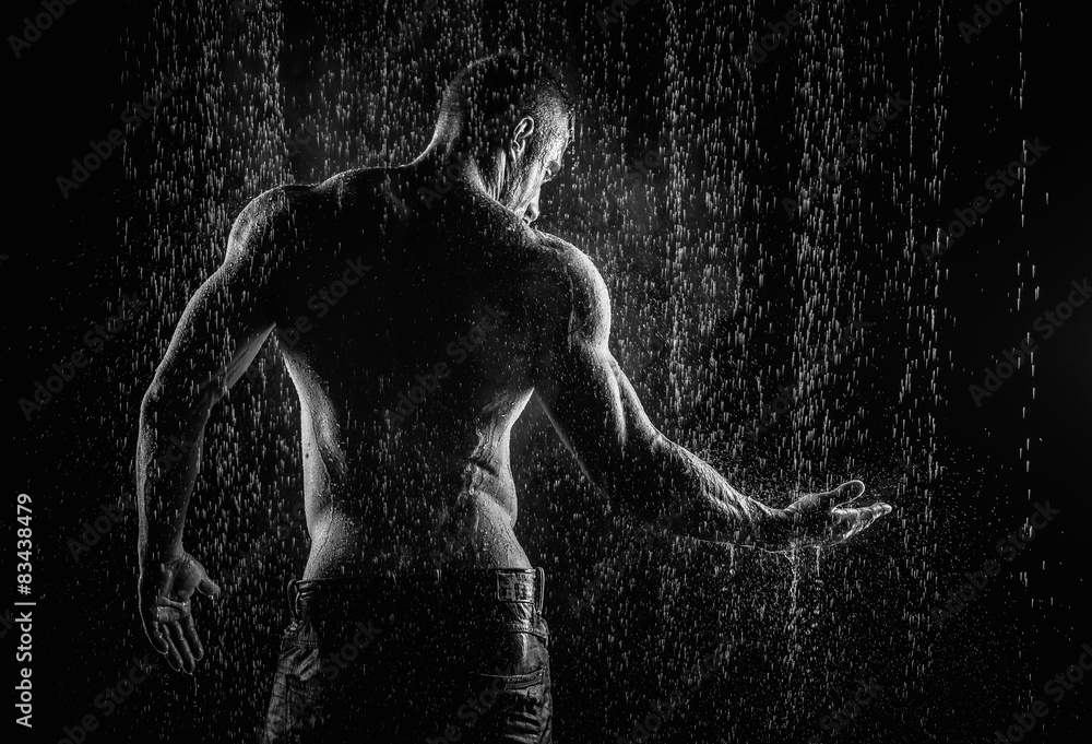 very muscular handsome athletic man in the rain Stock Photo | Adobe Stock