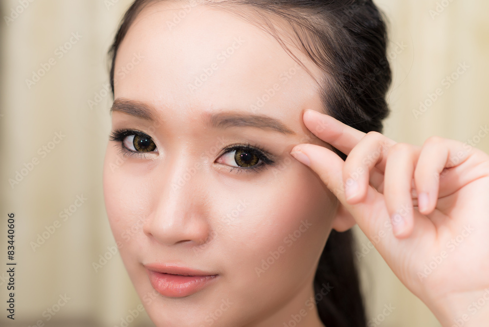 Beauty portrait of Asian woman with healthy skin on a face