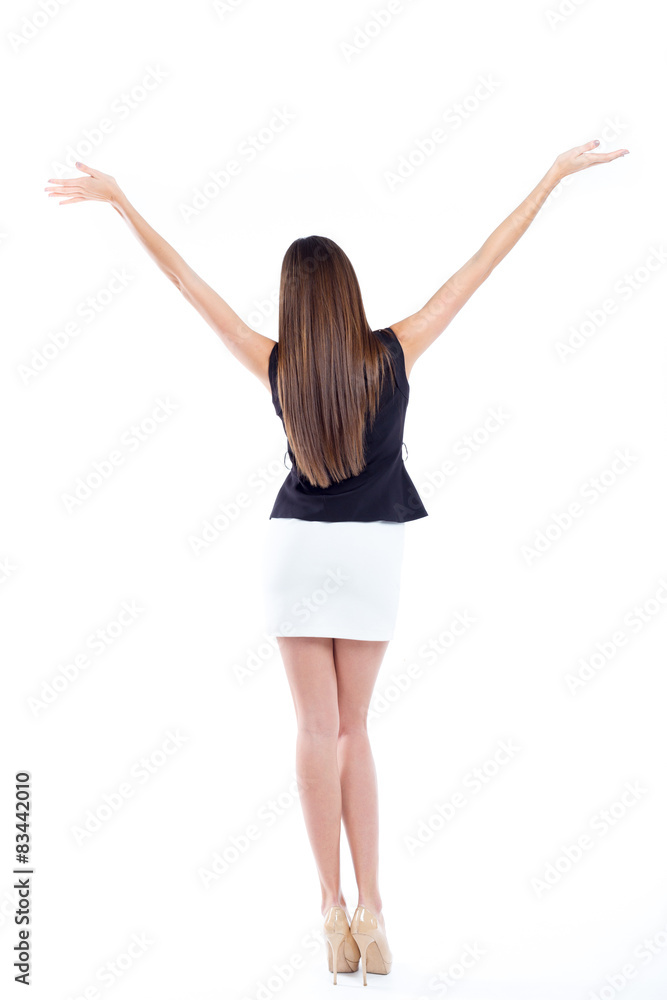 Attractive young woman standing isolated on white Attractive young woman standing isolated on white