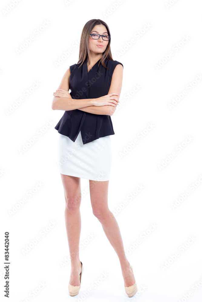 Attractive young woman standing isolated on white Attractive young woman standing isolated on white