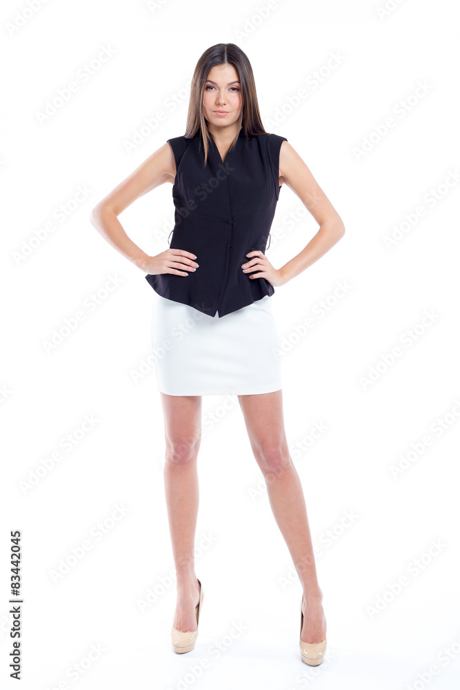 Attractive young woman standing isolated on white Attractive young woman standing isolated on white
