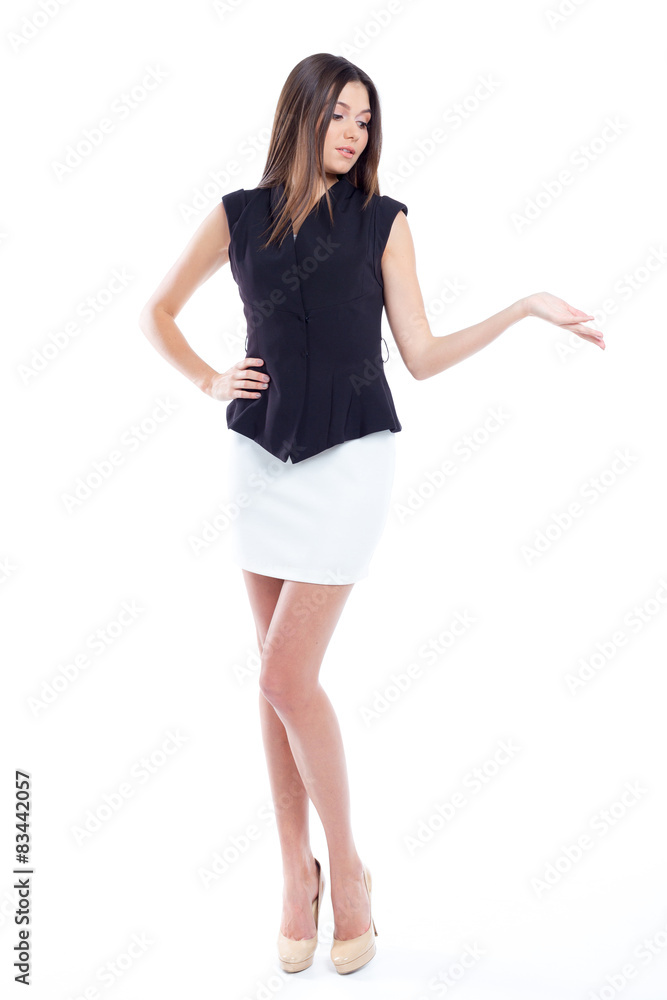 Attractive young woman standing isolated on white Attractive young woman standing isolated on white