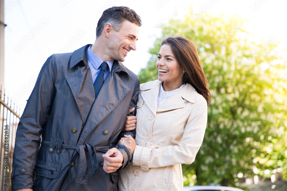 Happy young couple walking outdoors Happy young couple walking outdoors