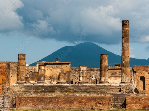 The temple of Jupiter in Pompeii; volcano Vesuvius in the background