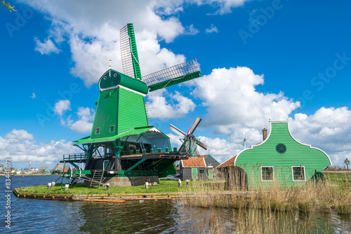 Fototapeta Naklejka Na Ścianę i Meble -  Zaanse Schans, Netherlands. Beautiful landscape with ancient win