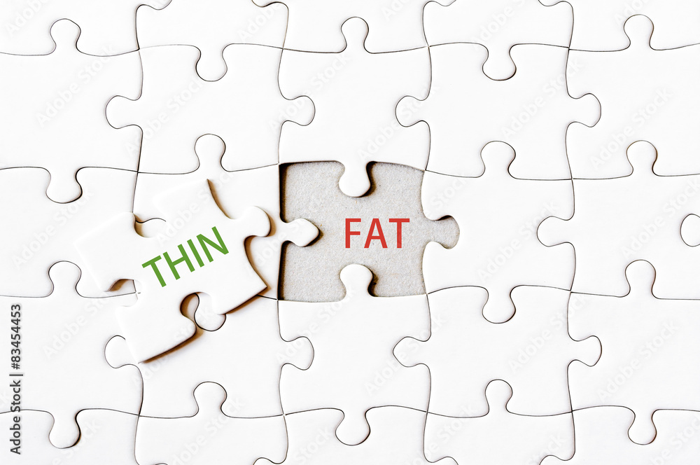 Fototapeta premium Missing jigsaw puzzle piece with word THIN