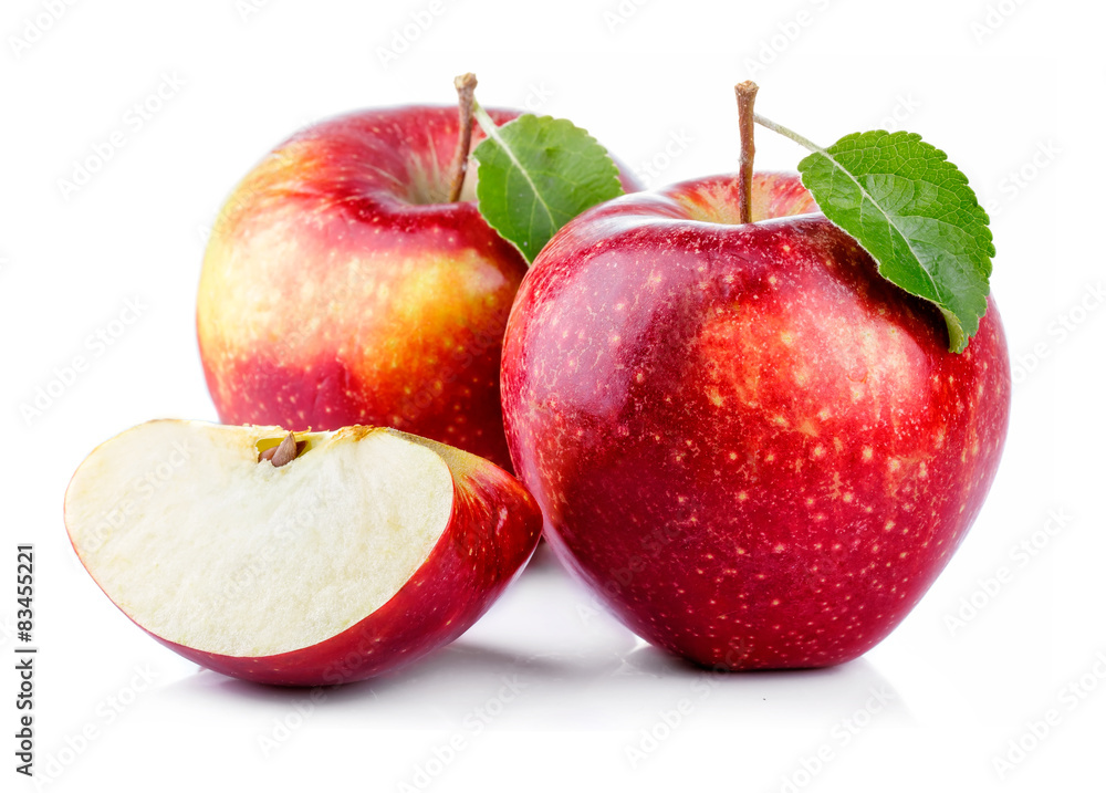 Red apples with leaf and slice isolated on a white