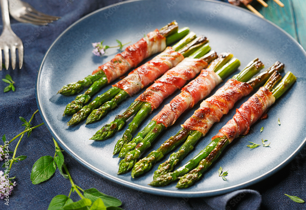 Grilled green asparagus wrapped with bacon Stock Photo Adobe Stock