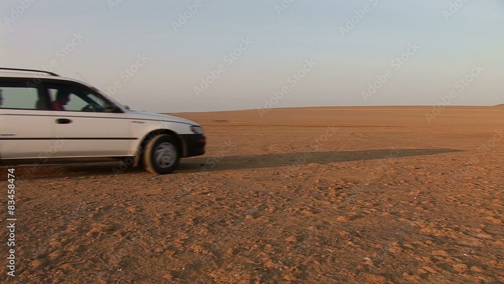 Car in Desert: Paracas National Park, Peru
Car in Desert: Paracas National Park, Peru