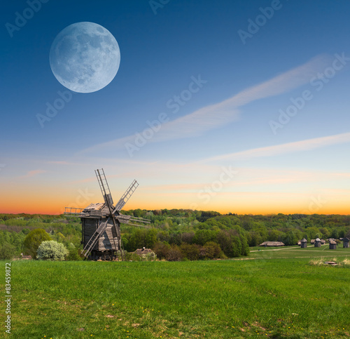 rural scene, old windmill at the early morning
