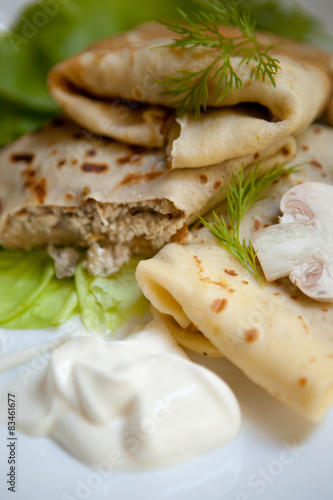 Crepes with the chicken, mushroom, lettuce 