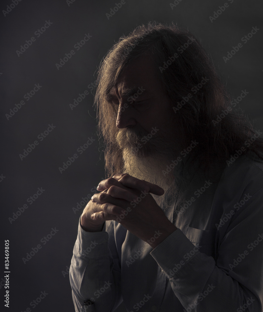 Senior Prayer, Old Man Praying with Folded Hands in Dark - obrazy, fototapety, plakaty 