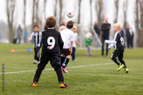 Soccer boys chasing ball © Mikkel Bigandt