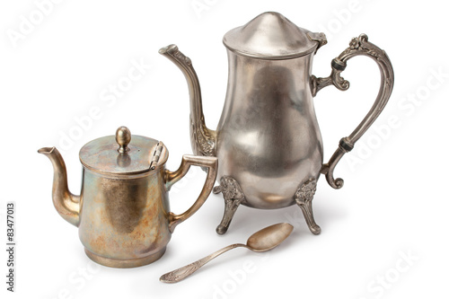 old coffee pots and silver spoon