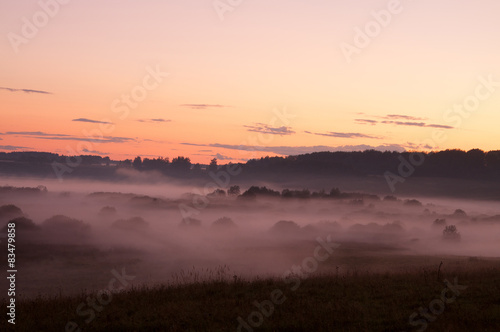 Beautiful foggy Rural Landscape before sunset