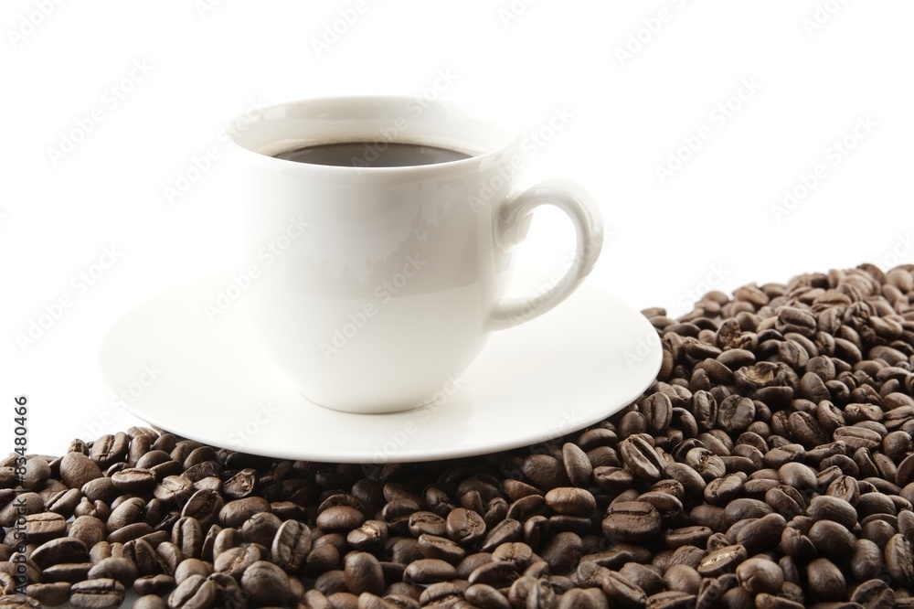 Line made of coffee beans with cup of coffee Line made of coffee beans with cup of coffee
