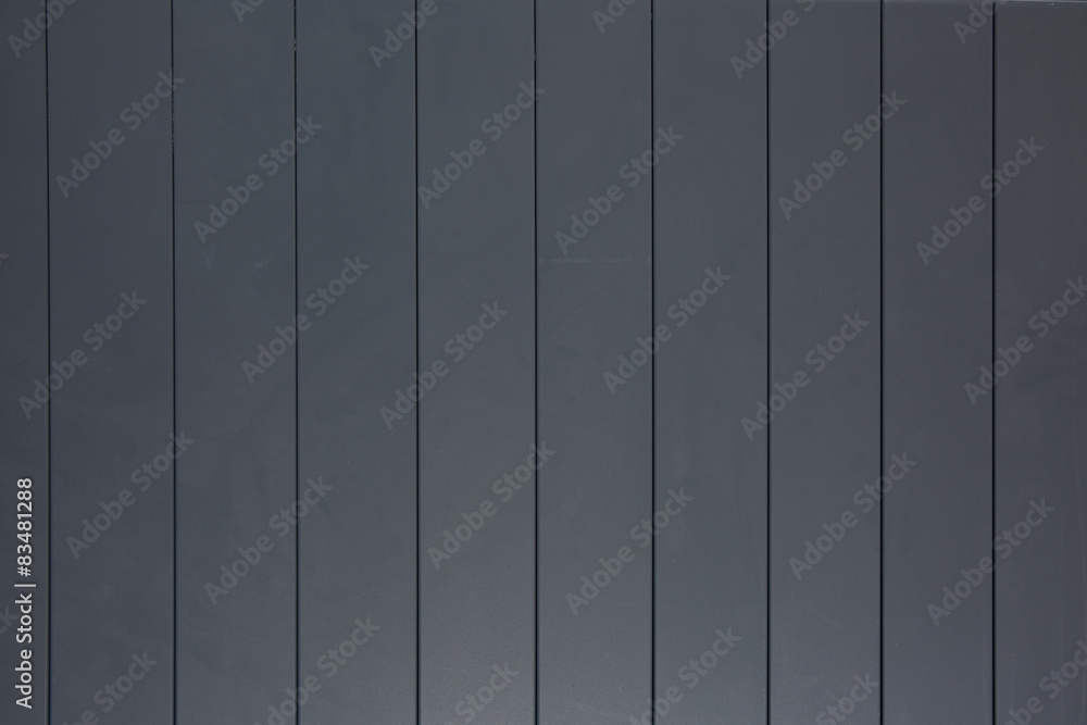 A natural dark gray wood wall texture A natural dark gray wood wall texture